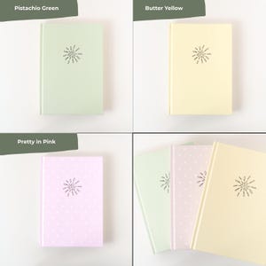 May include: A collection of notebooks in various pastel colors: pistachio green, butter yellow, and pretty in pink. Each notebook features a simple, stylized floral design in black on the cover.