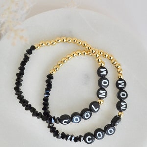 Custom personalized letter bracelet, stretchy black and gold image 1