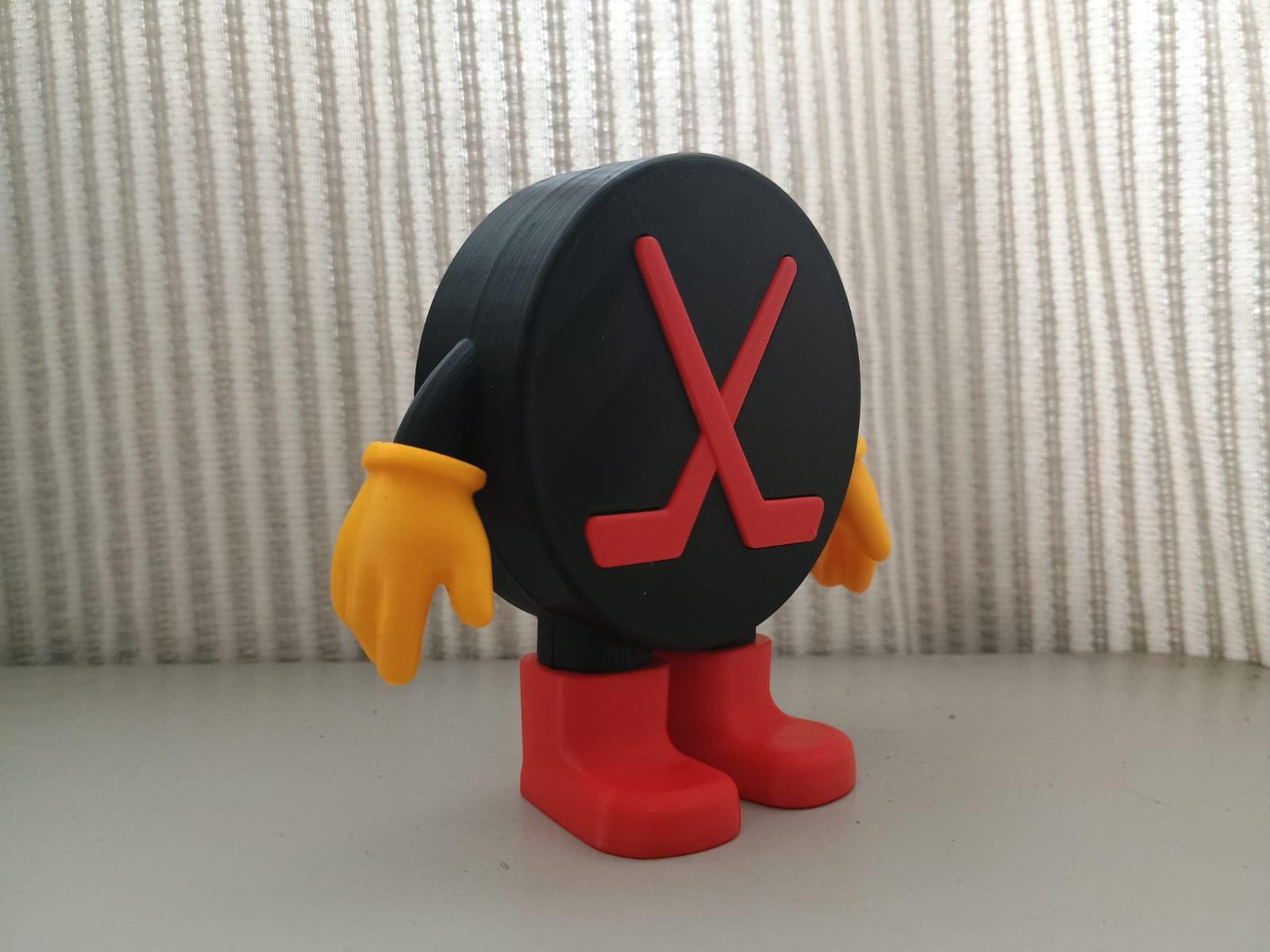 トイストーリーのホッケーパックとタイトルの3Dプリントおもちゃ