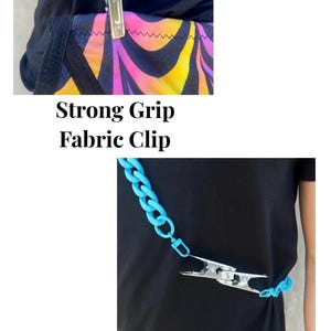 May include: A turquoise blue chain with a silver clip. The chain is worn around the waist and the clip is used to attach the chain to clothing. The text "Strong Grip Fabric Clip" is below the image. The text "You can clip them together while flowing" is below the second image.