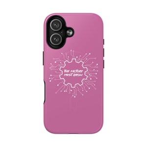 May include: A magenta phone case with a dual-lens camera cutout. The case features a white graphic of a gear with circuit-like lines and the text "THE FACTORY MUST GROW". The case has black side buttons.