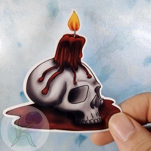 Griezelige schedel met bloedrode kaars Halloween-vinylsticker