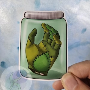 Halloween-vinylsticker Frankensteins monster hand in een pot