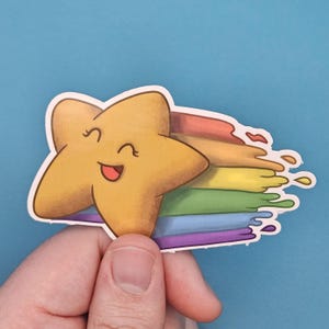 Schattige vallende ster met regenboogspoor, pastelkleurige vinylsticker voor tijdschriften, laptops en positiviteit