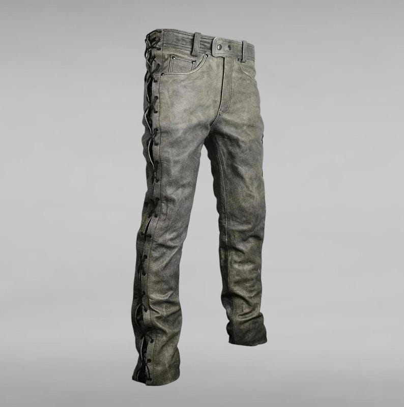 May include: Gray leather pants with black laces running up the sides of the legs.