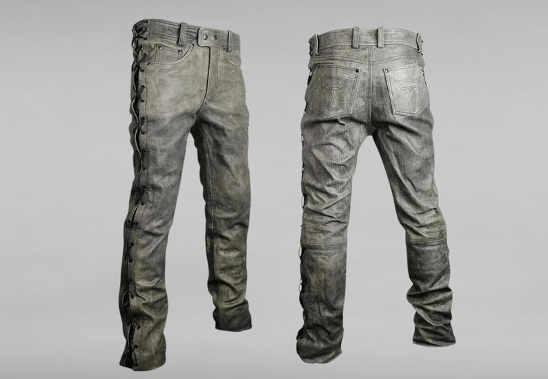 May include: A pair of gray denim jeans with black laces down the sides of the legs.