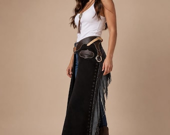 Chaparreras negras de ante con flecos para mujer, estilo vaquero western, chaparreras largas de piel de ciervo con flecos, chaparreras boho para festivales y estilo vaquero.