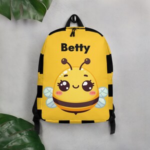 Fliegen Sie mit unserem Gelben Bienen-Rucksack ins Abenteuer - Personalisieren Sie mit dem Namen Ihres Kindes für einen Buzz-würdigen Look! Ideal für Schule und Spielverabredungen.