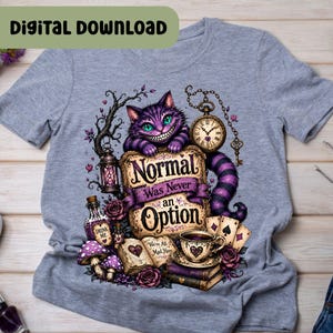 May include: A heather gray t-shirt featuring a graphic of a purple striped cat with green eyes, a pocket watch, a lantern, playing cards, a teacup, and an open book. The text reads, "Normal Was Never an Option" and "Drink Me".