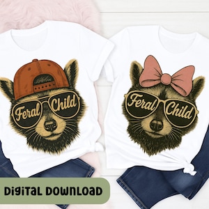May include: Two white t-shirts with raccoon graphics wearing sunglasses that read "Feral Child." One raccoon wears a brown cap, the other a pink bow. The phrase "Digital Download" is at the bottom.