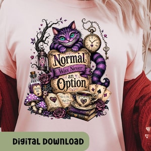 May include: A light pink t-shirt featuring a graphic of a purple striped cat with a wide grin, a pocket watch, a lantern, a bottle labeled Drink Me, mushrooms, playing cards, books, and the text Normal Was Never an Option and We're All Mad Here.