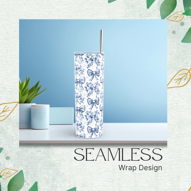 May include: A tall, stainless steel tumbler with a blue and white floral and bow pattern. The tumbler has a silver straw and the words "SEAMLESS Wrap Design" at the bottom. The tumbler is on a white surface with a blue background.
