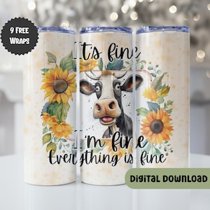 May include: A white tumbler with a black and white cow illustration and sunflowers. The text "It's fine, I'm fine, everything is fine" is printed on the tumbler.