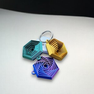 Hexagon Fidget-sleutelhanger: speelgoed voor sensorische stress