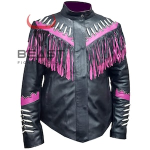 May include: Black leather jacket with pink fringe and silver accents. The jacket has a stand-up collar and a zipper closure.