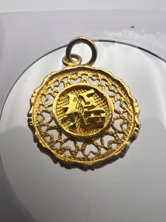 24k gold token of “good fortune”