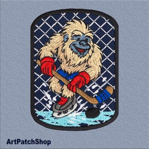 Hockey Bigfoot Patch – Funny Embroidered Bigfoot Playing Ice Hockey – Iron-On Badge for Jackets, Backpacks, or Gear. Size: 3,9x2,8 inches.