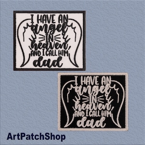 May include: Two embroidered patches with the text "I HAVE AN angel IN heaven, AND I CALL HIM, dad". One patch is black with white text and the other is white with black text. Both have wing designs.