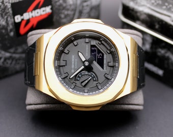 Casio G-SHOCK - Cuir CasiOak personnalisé Noir - Or | 44mm | Acier inoxydable - montre et montre-bracelet pour homme | Casio GA-2100