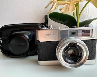 Cámara telemétrica antigua Minolta AL-F, objetivo Minolta Rokkor 1:2,7 f=38 mm