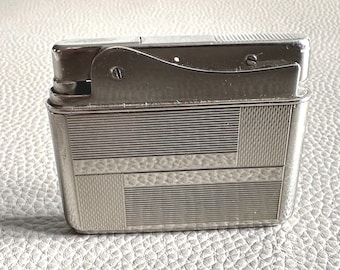 Zippoライター レイガン　CVN 76 Collectible ZIPPO Lighter USS Ronald Reagan CVN-76 2003 - Etsy