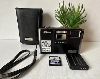 Nikon Coolpix S1000pj 12.1 MP Digital Camera Projector