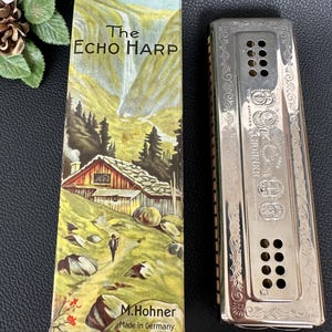 Vintage M. Hohner Echo Harp dubbelsidig tremolo-munspel (C/G-toner), tillverkad i Tyskland