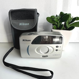 Nikon F-301 + Nikkor 50mm f/1.8 Série E - Réflex Argentique – France Argentique