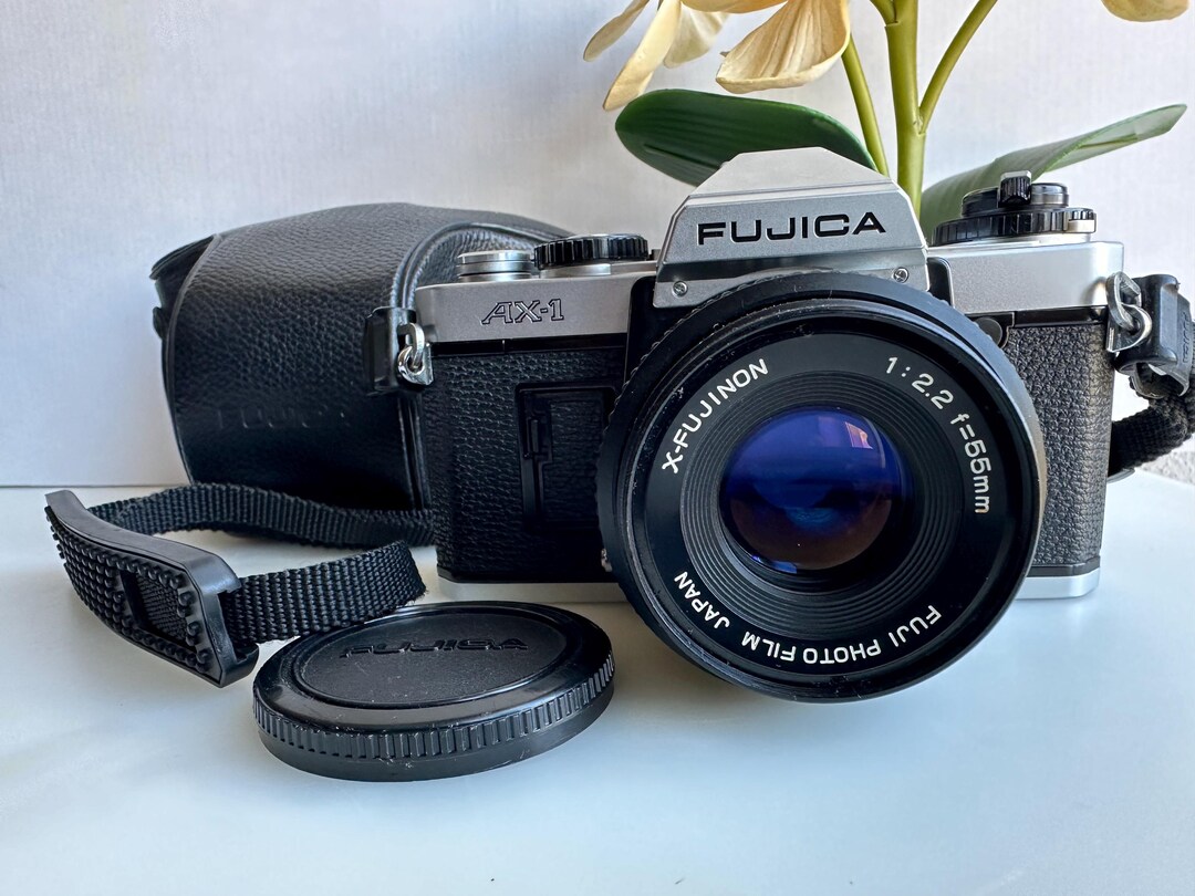 FUJICA フジカ AX-1 & X-FUJINON 55mm F2.2 Fujica AX-1 Camera | X-Fujinon 55mm f2.2 lens | White