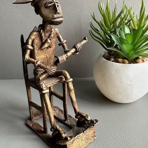 Vintage African bronze figurine of Ashanti king sitting on throne, made by Ashanti people in Ghana or other African country around 1950-70’s