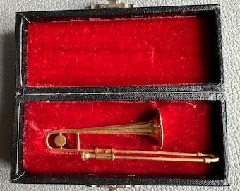 Miniature musical instrument trumpet trambone