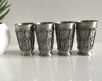 A set of four vintage pewter schnapps glasses from Germany