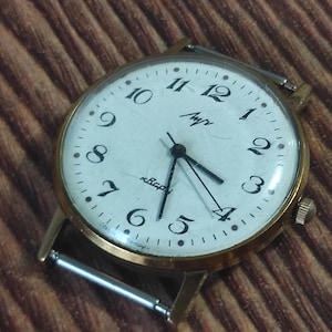 Vintage men's slim watches Luch Quartz USSR serviced!