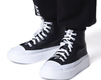 Black kids leather sneakers with white soles AKEL