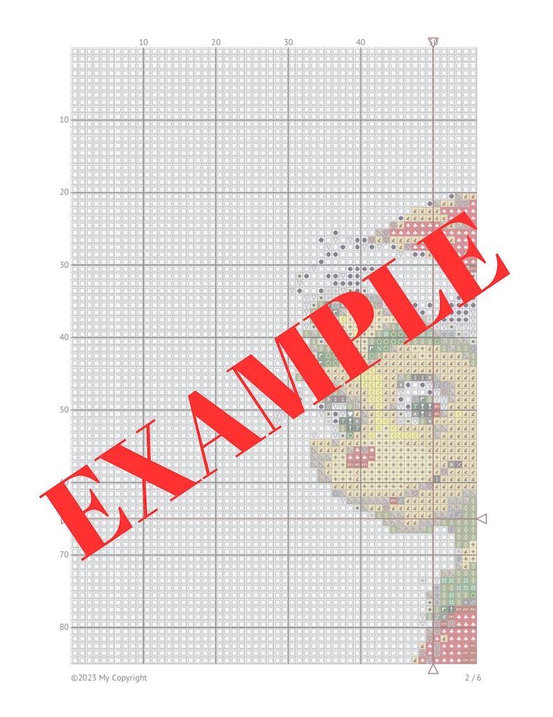 May include: A cross-stitch pattern chart with a grid of squares. The chart shows a design of a yellow bird with a red beak and black eyes. The bird is surrounded by green leaves and flowers. The chart is labeled "EXAMPLE" in red.