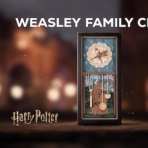 May include: A wooden wall clock with a blue and brown design featuring a house and the words "It's not work if you love it". The clock face is white with black numbers and hands. The clock is framed in black wood and has the words "Weasley Family Clock" above it.