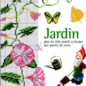 May include: A book cover with a green title "Jardin" and the text "Carnet de point de croix" and "plus de 400 motifs à broder aux points de croix". The cover features a colorful cross-stitch design of a flower, leaves, and a butterfly.