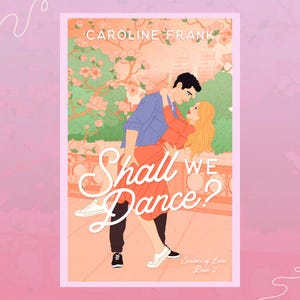 May include: Book cover illustration of a couple dancing in a park with a pink and orange sunset in the background. The title of the book is "Shall We Dance?" and the subtitle is "Seasons of Love, Book 2".