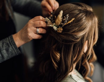 Pettini per capelli con fiori secchi