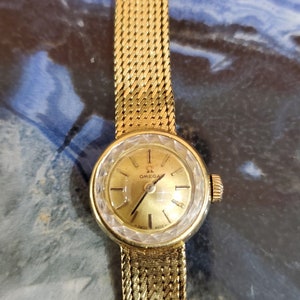 Omega 18k 0750 sale