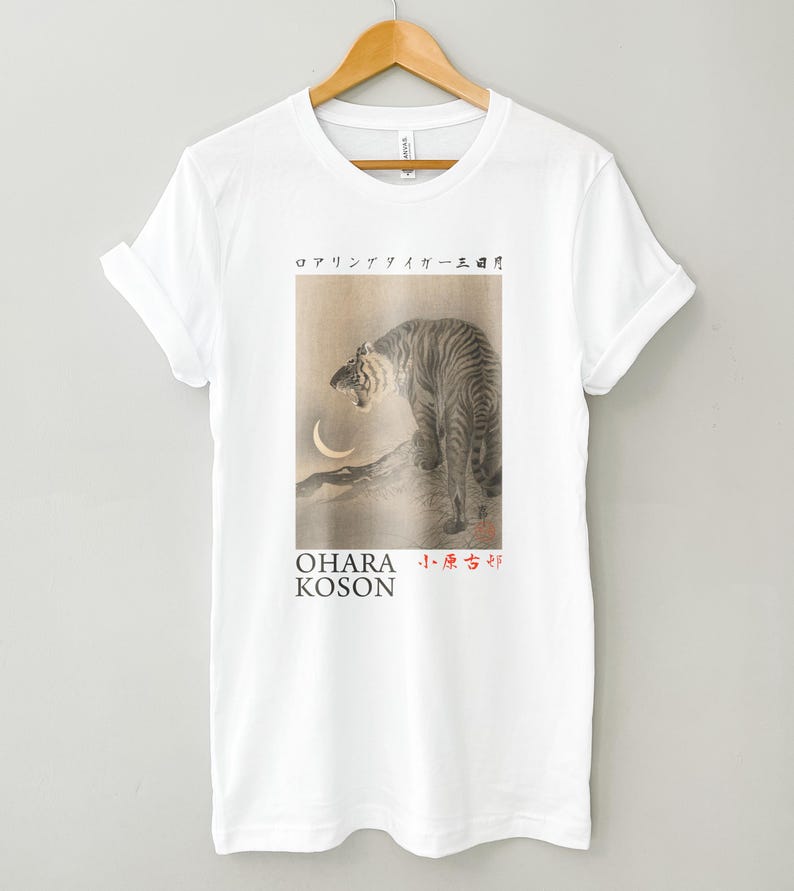 May include: White t-shirt with a black and white image of a tiger roaring at a crescent moon. The text "OHARA KOSON" and Japanese characters are printed below the image.