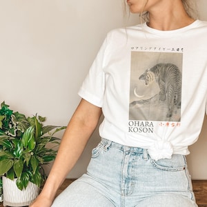May include: White t-shirt with a black and white illustration of a tiger with the text "OHARA KOSON" and Japanese characters below the image.