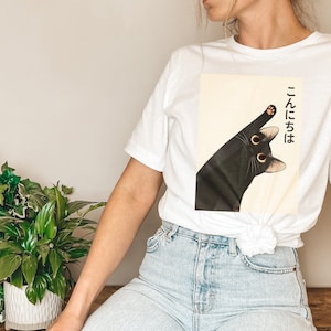 こんにちは猫Tシャツ、日本のこんにちはTシャツ、かわいいグラフィックTシャツ、面白い黒猫Tシャツ、猫好きへのギフト、アニメ猫Tシャツ