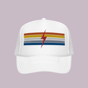 May include: White trucker hat with a red lightning bolt and a multi-colored stripe design.