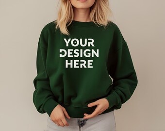 May include: A green sweatshirt with the text "YOUR DESIGN HERE" in white.