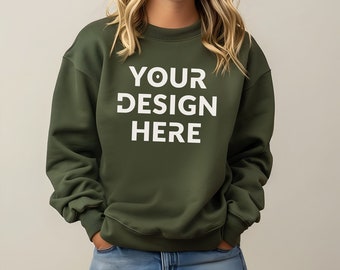 May include: A green sweatshirt with the text "YOUR DESIGN HERE" printed in white on the front.