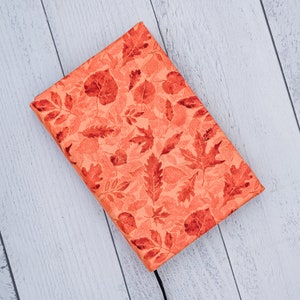 Adjustable Dust Jacket, Fabric Book Jacket, Protective Book Jacket - Orange Leaves with Gold Accents