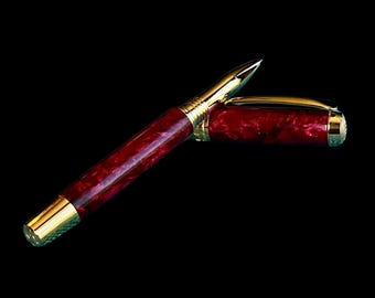 Radiant Ruby Gold Rollerball Pen | Handcrafted Gift Set with A5 Journal & Caran d’Ache Ink