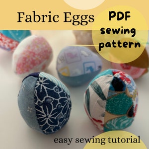 May include: A set of six fabric eggs in various patterns, including floral, geometric, and abstract designs. The eggs are sewn from different fabrics and are ready to be filled with stuffing. The image includes the text "Fabric Eggs PDF sewing pattern easy sewing tutorial".
