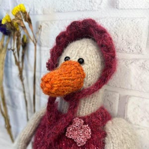 Knitted toy goose in a hat - soft interior handmade toy